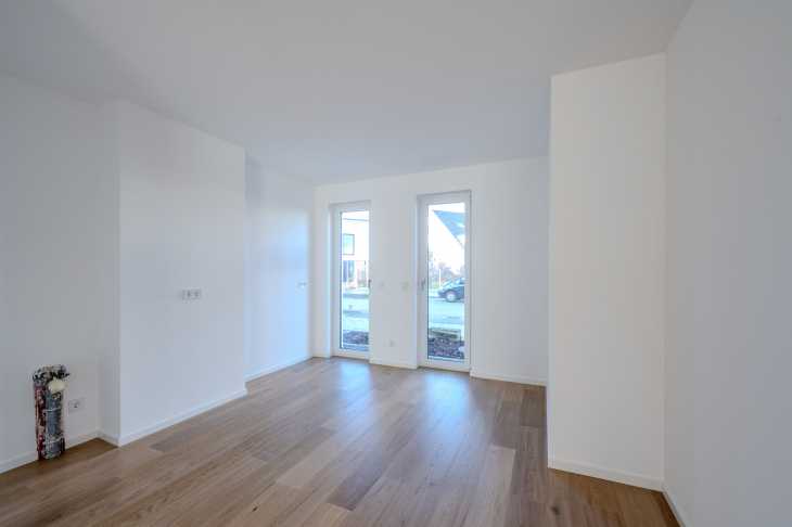 Offene Küche zum Wohnbereich und edle Oberflächen