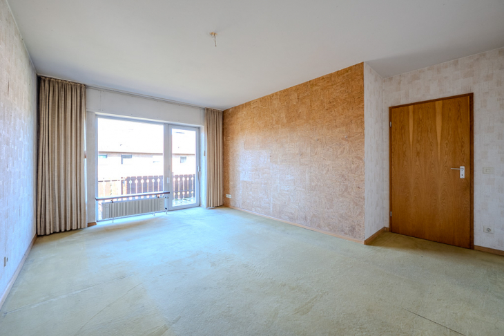 Schlafzimmer mit Zugang zum Balkon