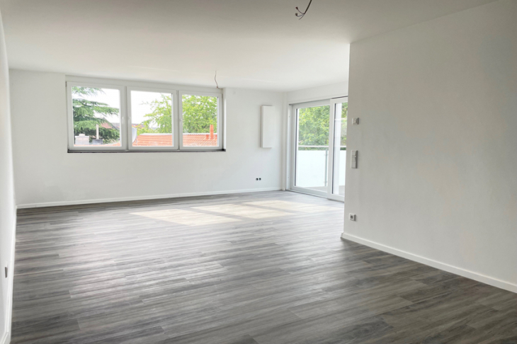 Wohnzimmer mit anliegender Terrasse